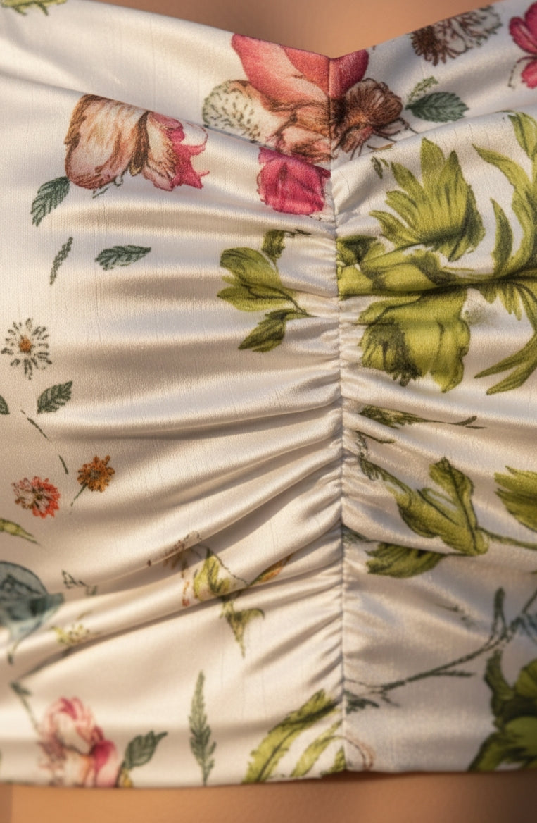 Close-up of floral fabric with a visible seam